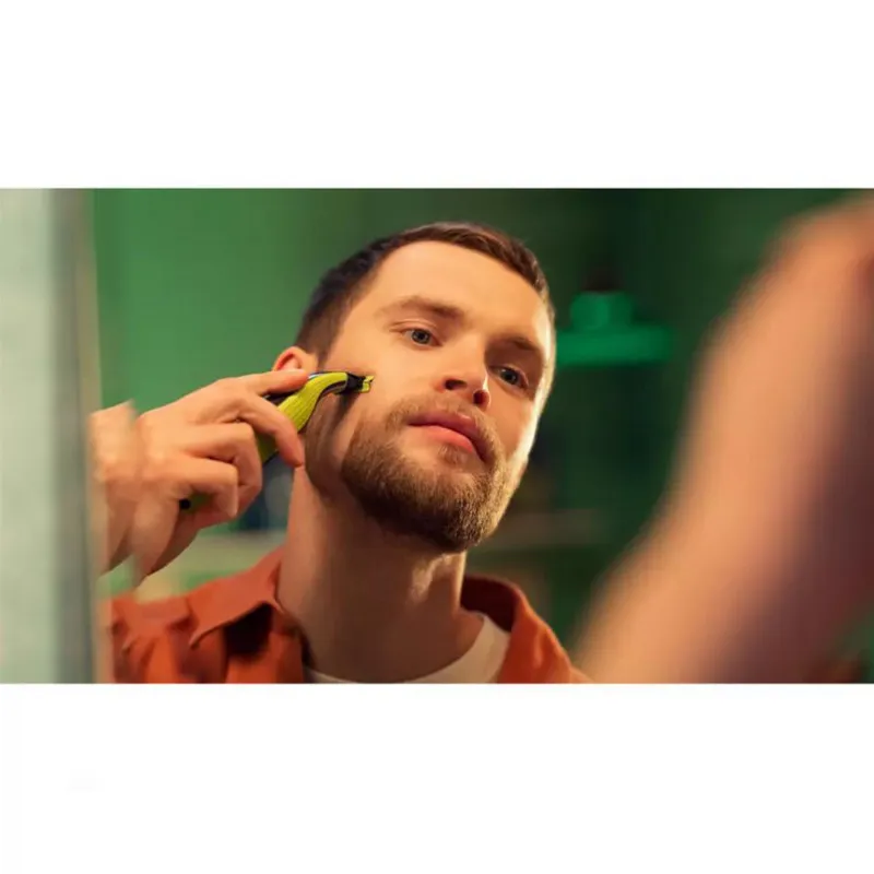ماشین اصلاح موی صورت فیلیپس مدل QP2724/10 با قابلیت استفاده خشک و مرطوب، ضدآب، تیغه استیل ضدزنگ کربن ضدحساسیت، سیستم محافظت دوگانه، سه شانه 1، 3 و 5 میلیمتری، شارژ 8 ساعت و عمر تیغه 4 ماه - تصویر 3