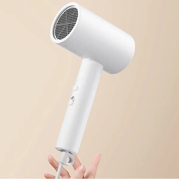 سشوار مسافرتی 1600 وات میجیا مدل H101، موتور AC، وزن 500 گرم، دارای سری متمرکز‌کننده باریک با ویژگی صاف‌کنندگی، حجم‌دهندگی، با قابلیت باد سرد - تصویر 5