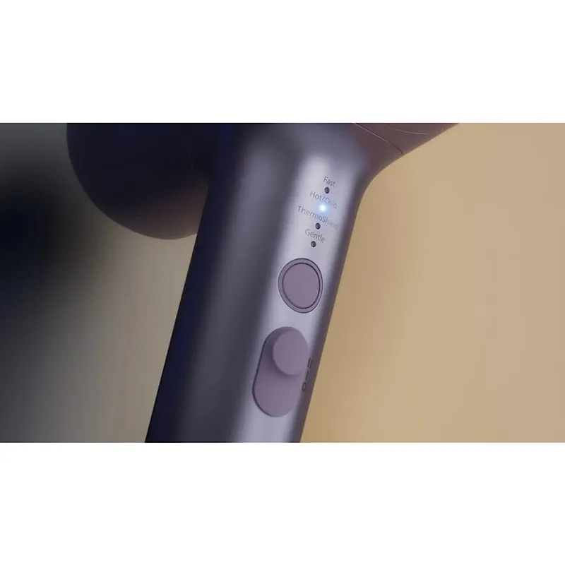 سشوار حرفه‌ای 1800 وات فیلیپس مدل BHD720، موتور DC، وزن 950 گرم، دارای سری دیسپانسر، متمرکز‌کننده باریک با ویژگی فرکنندگی، صاف‌کنندگی، حجم‌دهندگی، با قابلیت فناوری تولید یون - تصویر 6