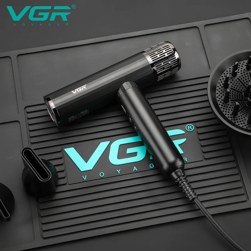 سشوار حرفه‌ای 1600-1900 وات وی جی ار مدل V-427، موتور AC، وزن 550 گرم، المنت سرامیک، دارای سری دیسپانسر، متمرکز‌کننده باریک، متمرکز‌کننده پهن با ویژگی فرکنندگی، صاف‌کنندگی، حجم‌دهندگی - تصویر 5