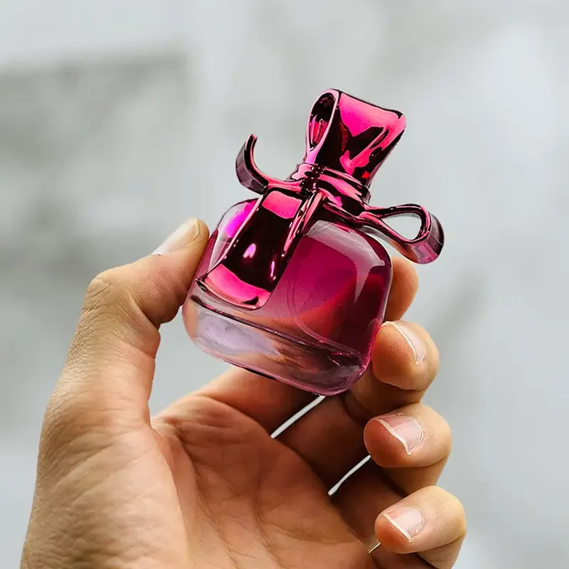 عطر جیبی زنانه ویکینگ مدل ریچی 055 با رایحه گرم حجم 25 میلی لیتر - تصویر 2