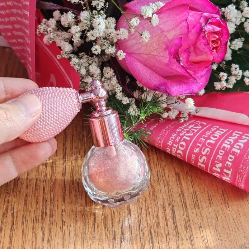 هایلایتر پودری جوجولاکی مدل افشانه رنگ صورتی اکلیلی - تصویر 4