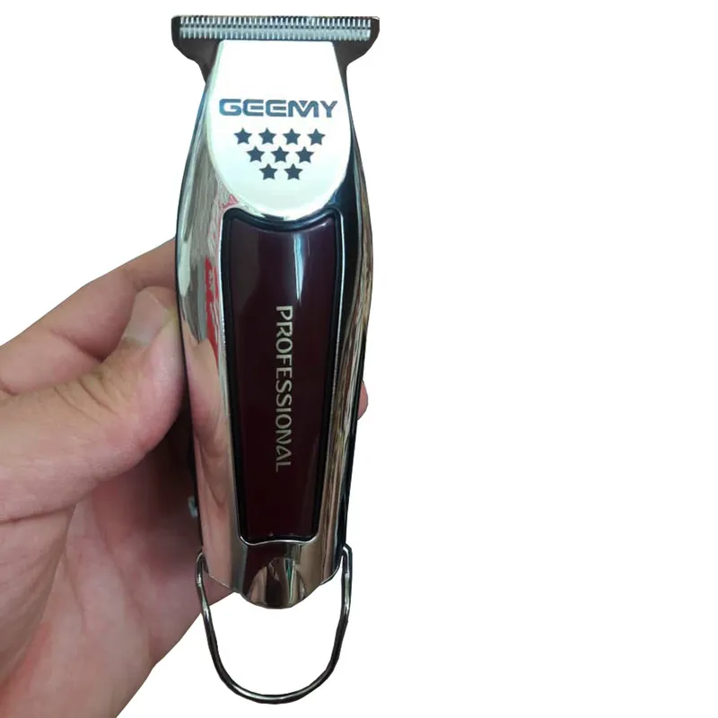 ماشین اصلاح موی سر و صورت جیمی مدل GM 855 با تیغه استیل ضد زنگ، باتری لیتیوم یون، دو سرعت موتور قابل تنظیم، منبع تغذیه برق و باتری قابل شارژ، همراه با 3 عدد شانه متحرک و طراحی ارگونومیک - تصویر 6
