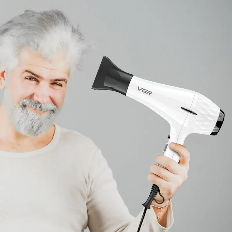 سشوار حرفه‌ای 2200 وات وی جی ار مدل V-413، موتور AC، وزن 802 گرم، المنت سرامیک تورمالین، دارای سری متمرکز‌کننده باریک، متمرکز‌کننده پهن با ویژگی صاف‌کنندگی، حجم‌دهندگی، با قابلیت باد سرد - تصویر 3