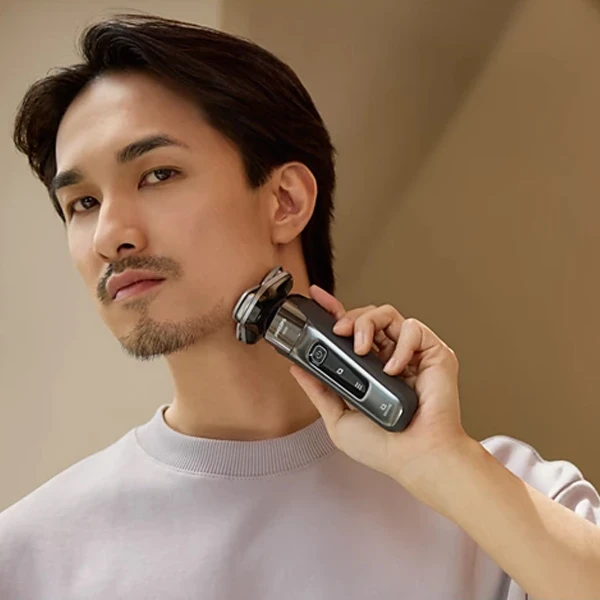 ماشین اصلاح موی صورت شارژی فیلیپس مدل X9002/05 با تیغه استیل ضد زنگ، ضد آب و قابل استفاده خشک و مرطوب، طراحی ارگونومیک، باتری لیتیوم یون با شارژ سریع 60 دقیقه، نمایشگر میزان شارژ و - نمای 5