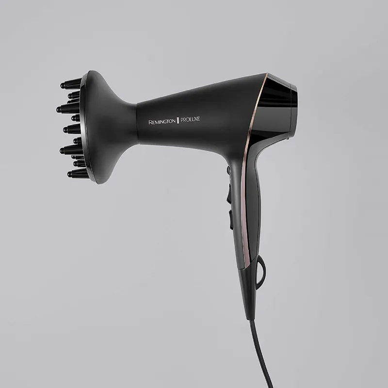 سشوار حرفهای 2400 وات رمینگتون مدل AC9140B Proluxe، موتور AC، وزن 300 گرم، دارای سری متمرکزکننده با ویژگی صافکنندگی، با قابلیت باد سرد، عملکرد توربو، فناوری تولید یون - تصویر 5