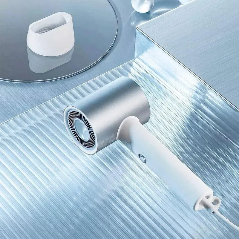 سشوار مسافرتی 1800 وات میجیا مدل Water Ion H500، موتور DC، وزن 595 گرم، دارای سری متمرکزکننده باریک، با قابلیت فناوری تولید یون، باد سرد - تصویر 4