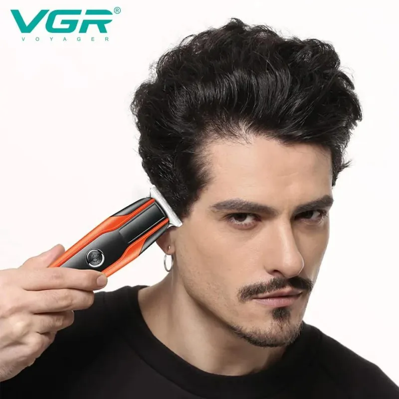 ماشین اصلاح موی سر و صورت وی جی آر مدل V-999 با تیغه استیل پیشرفته، اصلاح دقیق 0.01 میلیمتر، استفاده خشک و مرطوب، باتری شارژی 90 دقیقه کارکرد و 4 شانه تنظیم طول - تصویر 4