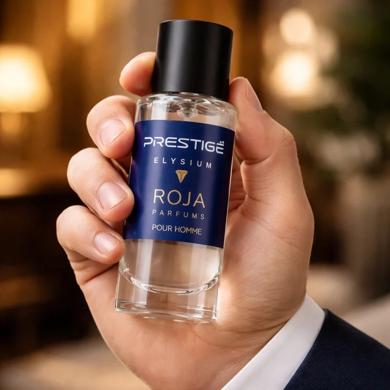 عطر جیبی مردانه پرستیژ مدل ROJA با رایحه گرم و تلخ حجم 35 میلی‌لیتر - تصویر 2